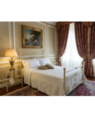Letto una piazza e mezza Mimosa in ferro battuto artigianale, finitura Avorio RAL 1015 decorato oro, per rete 120x190.
