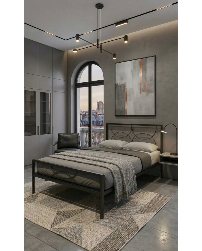 Letto in ferro nero Aura con testata a cerchi moderni e rete a doghe integrata. Design minimale e struttura robusta artigianale.