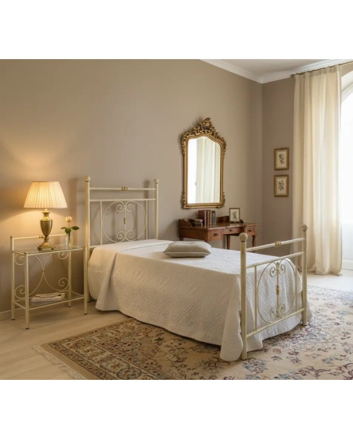 Letto singolo “Mimosa” avorio oro in ferro battuto artigianale, caratterizzato da linee eleganti e raffinate